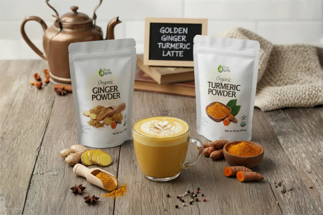 Golden ginger turmeric latte with organic ginger and turmeric powder packets on wooden table