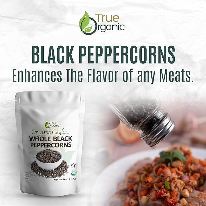 True Organic black peppercorns packaging with a blurred background of a dish.